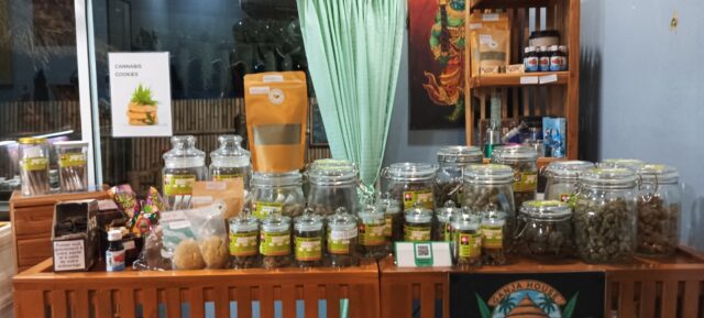 Our store counter with many but not all of our strains, along with cookies, jellies, cbd products, paraphernalia such as Teak Wood and Glass Bongs and papers, Rips etc.